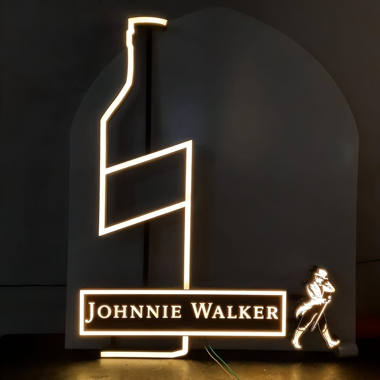 Johnnie Walker illuminated backlit sign installation