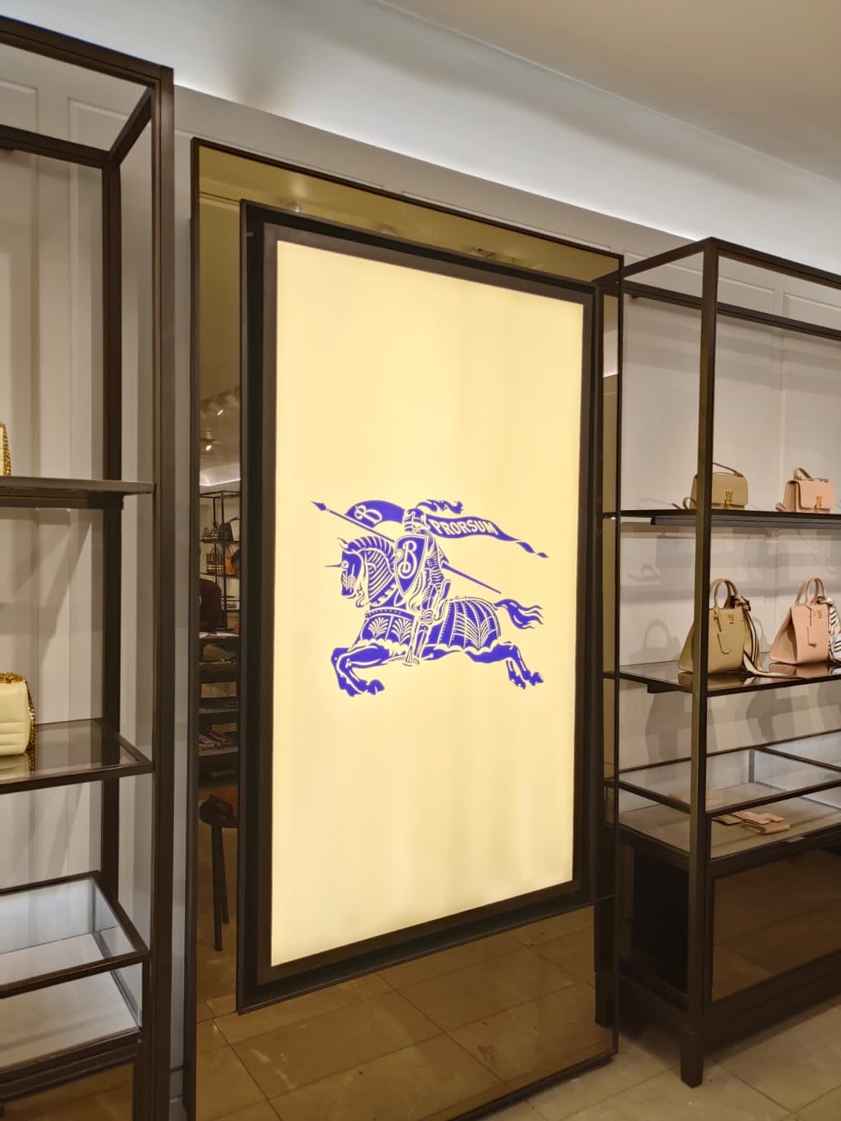 Burberry store — luxury retail fit-out and lightbox display